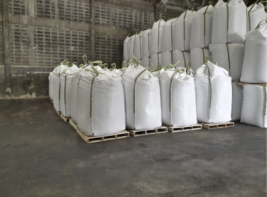 Bulk fertilizer bags in warehouse
